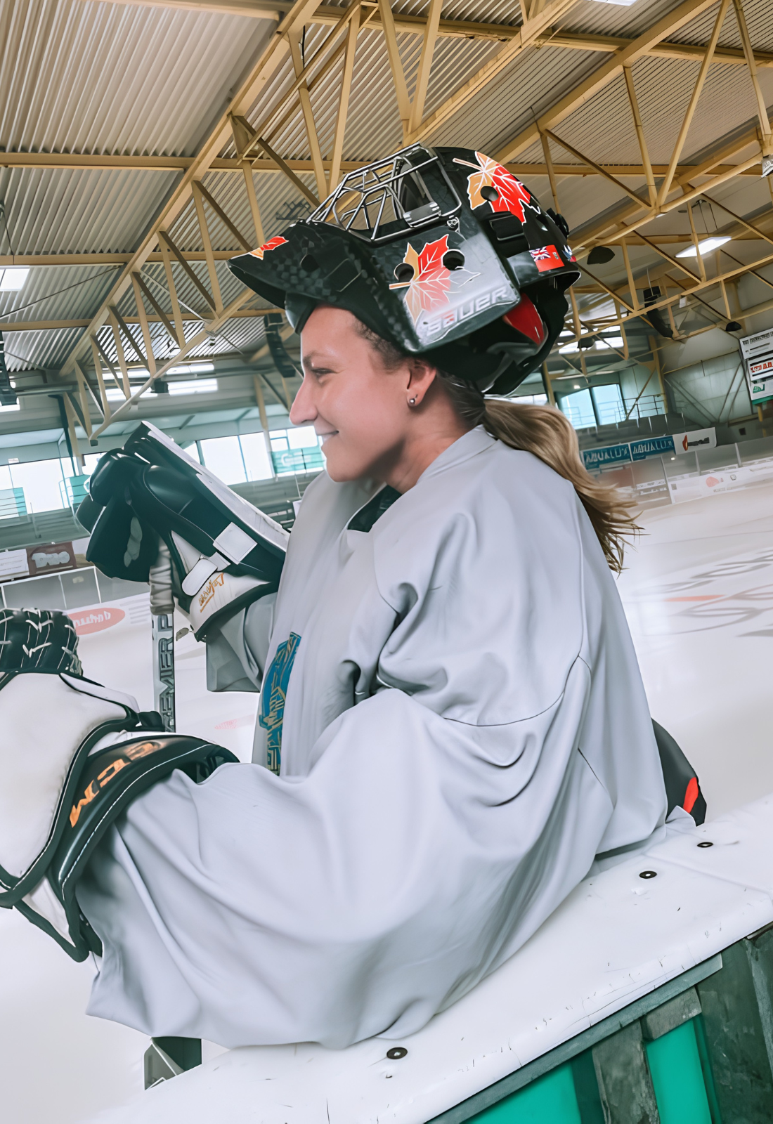 Taylor Cook coaching on the ice